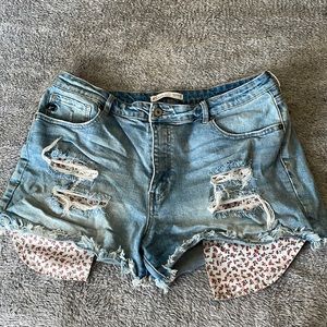 Kancan distressed denim shorts with long flower pockets